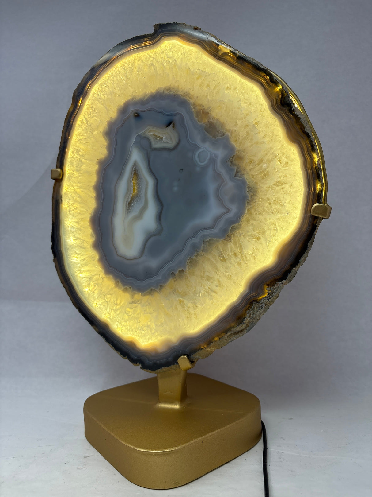Blue Agate Druze Slice with Blue & Cream Center On Illuminated Table Stand - Gold