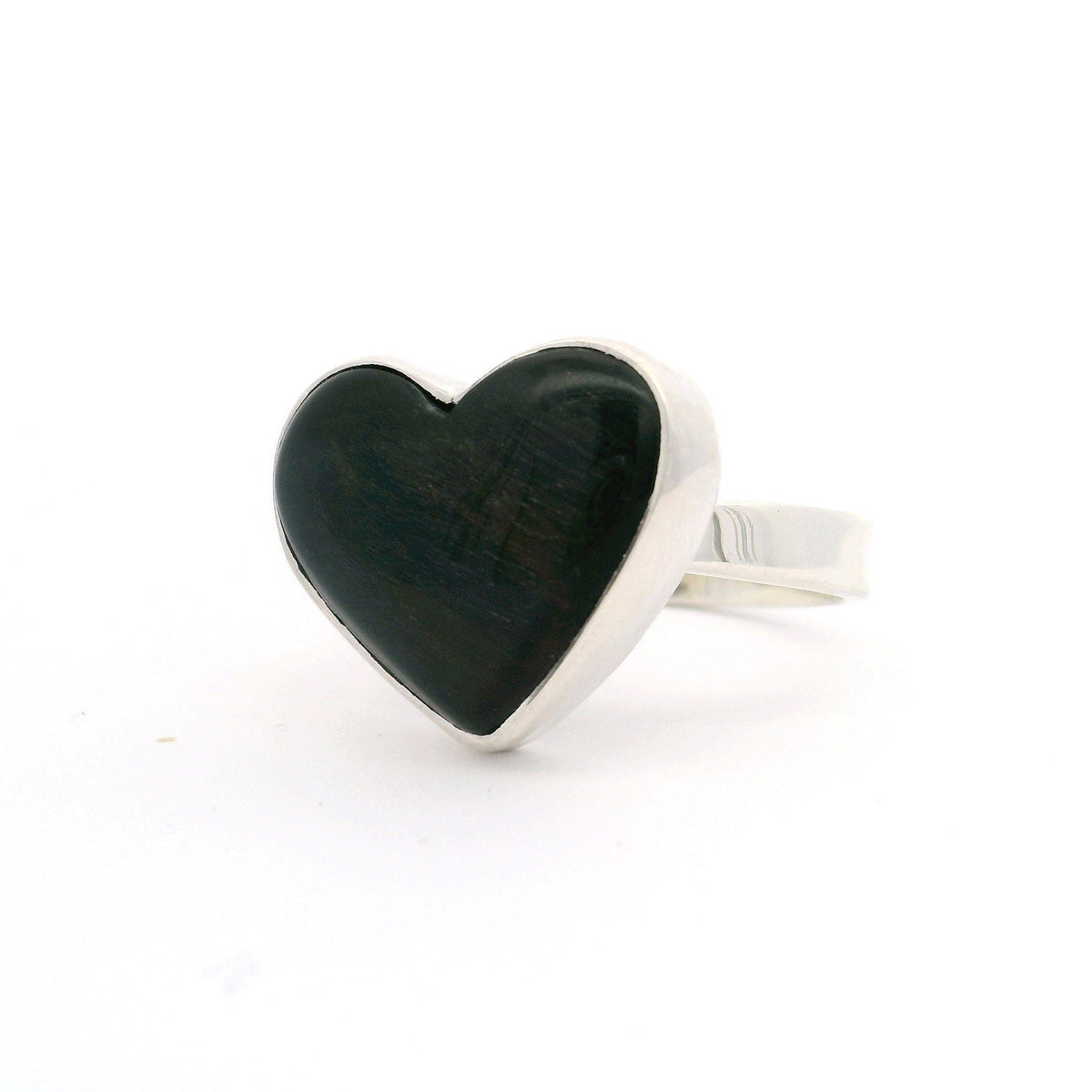 Blue tiger's eye heart cabochon bezel-set in simple sterling silver