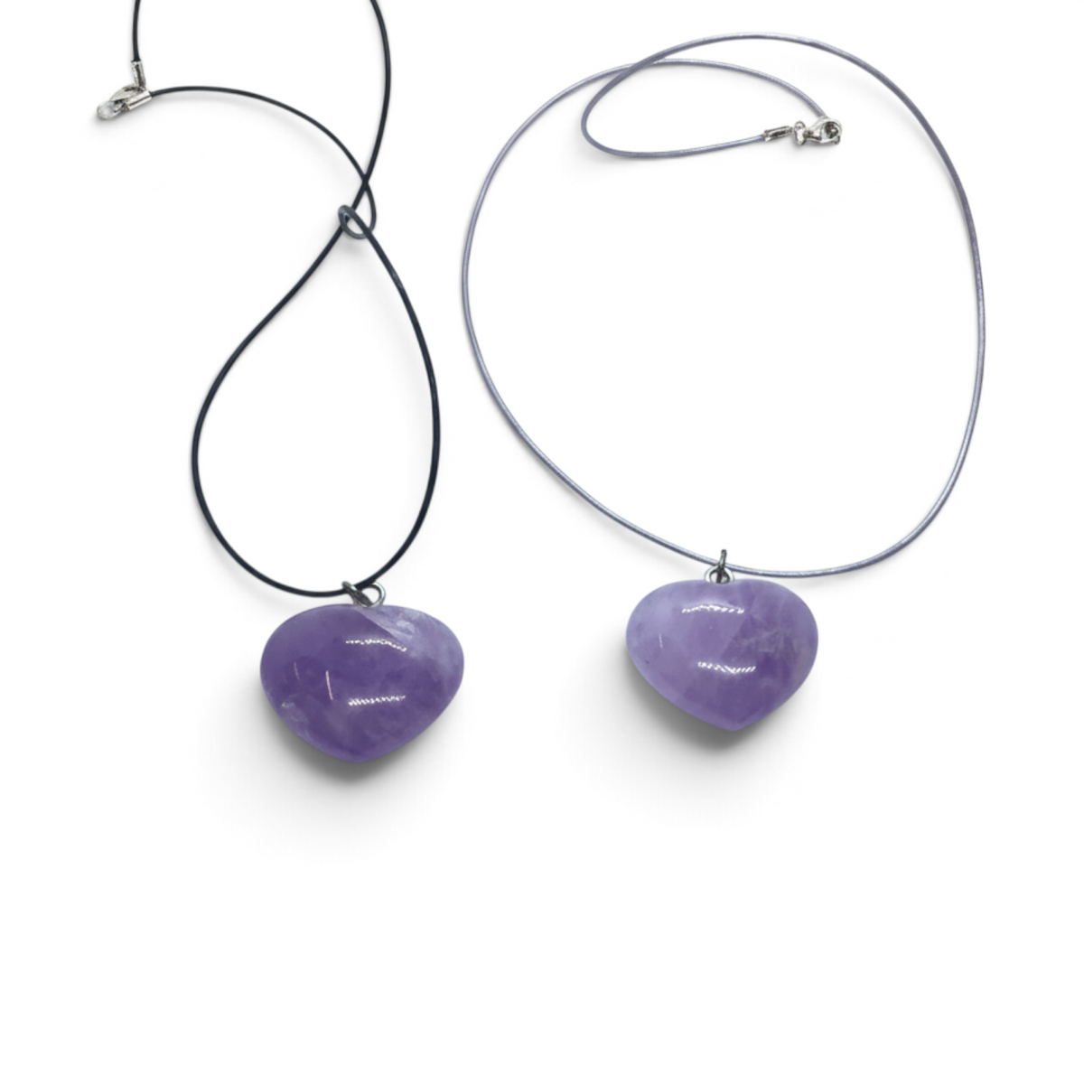 Rare Earth Gallery amethyst heart pendant necklaces on black and grey cords against a white background