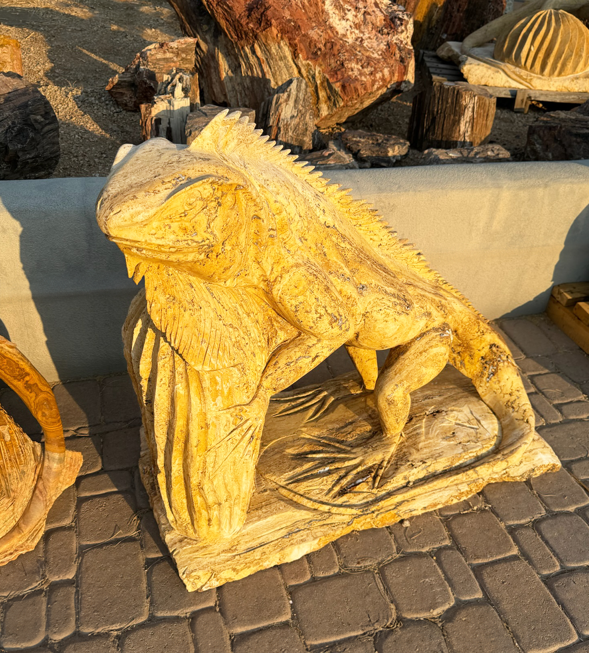 View of Travertine Iguana With Cactus Carving