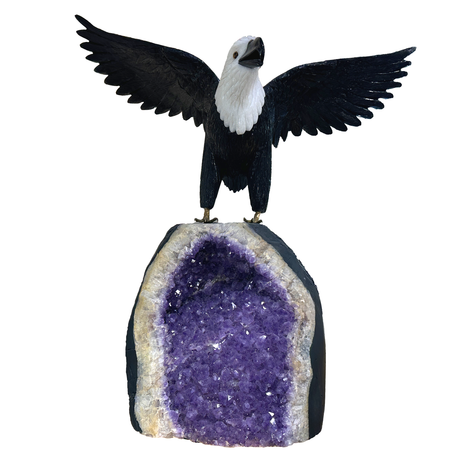 View of Black Onyx Bird With Dolomite Head Perched On Amethyst