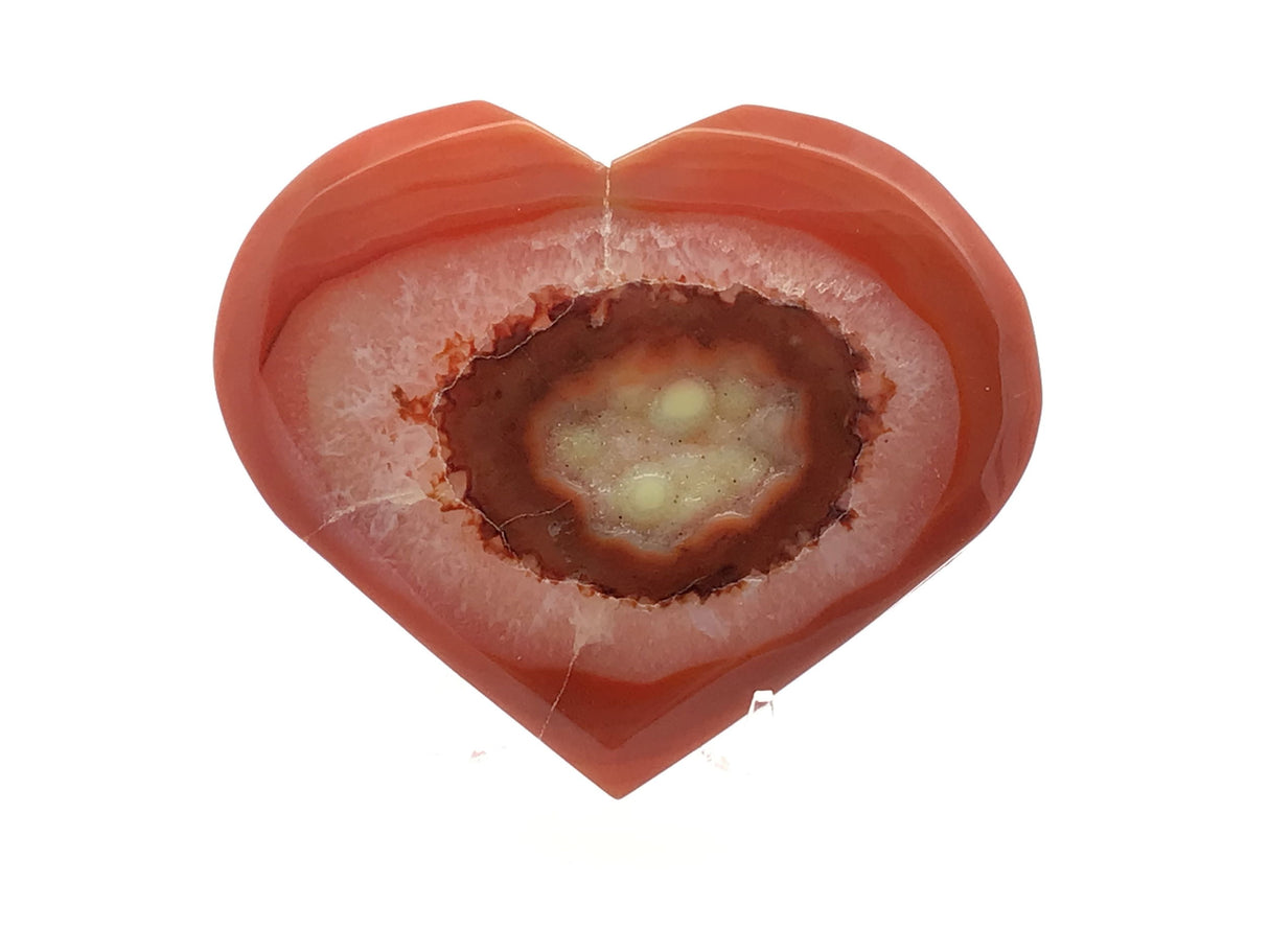 Sardonyx Carnelian Agate Heart Flat with Druze on Lucite Stand - Red-Orange Banding Around Clear Quartz Band with Red Bullseye Surrounding Shallow Yellow Druze Pocket