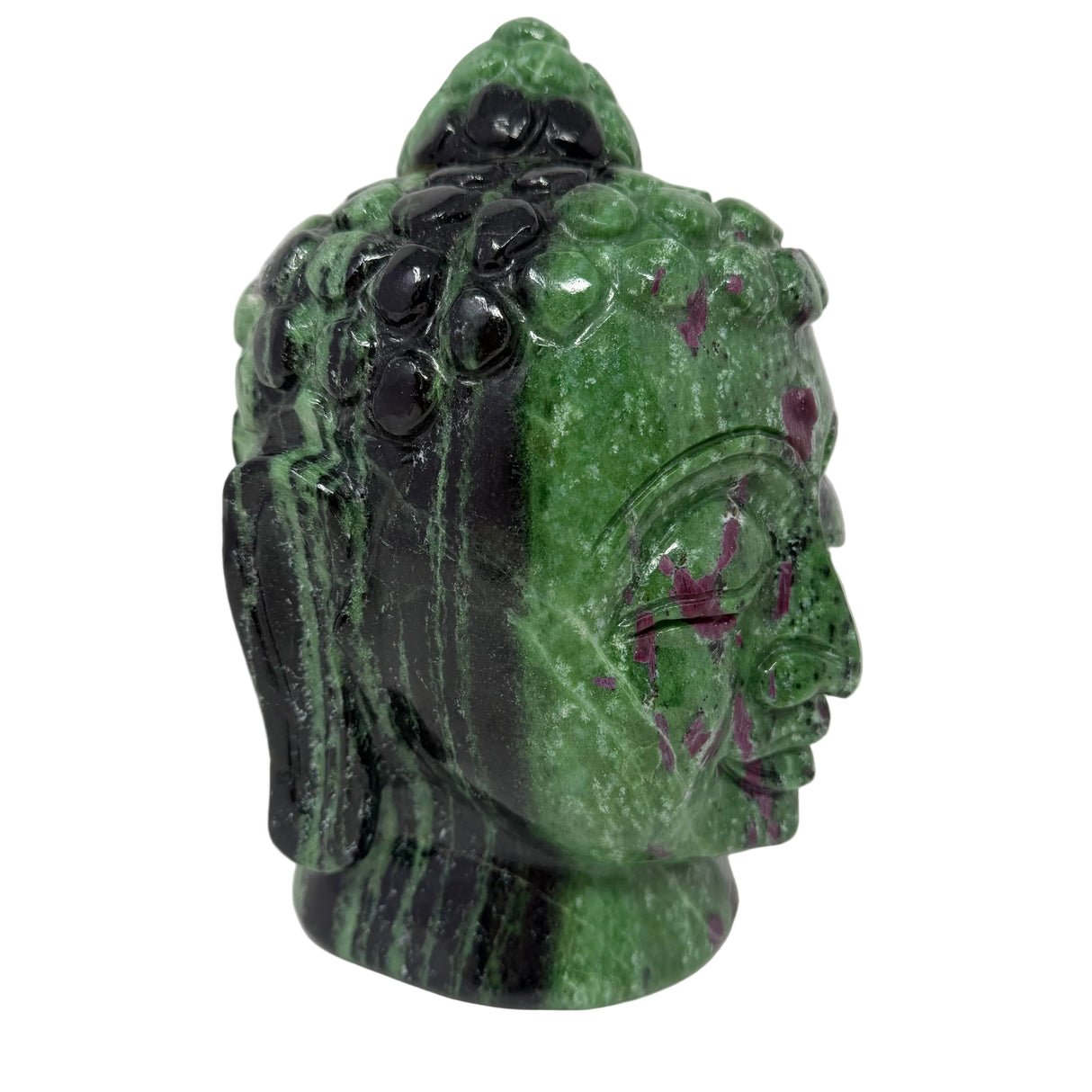 Green stone Buddha head sculpture on a white background
