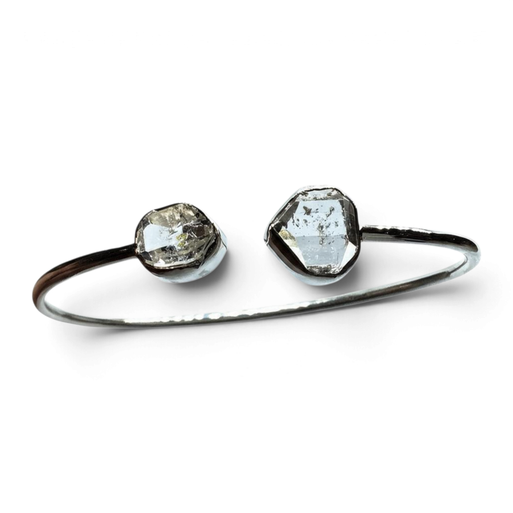 Rare Earth Gallery sterling silver twist bracelet featuring two bezel-set freeform Herkimer diamond crystals.