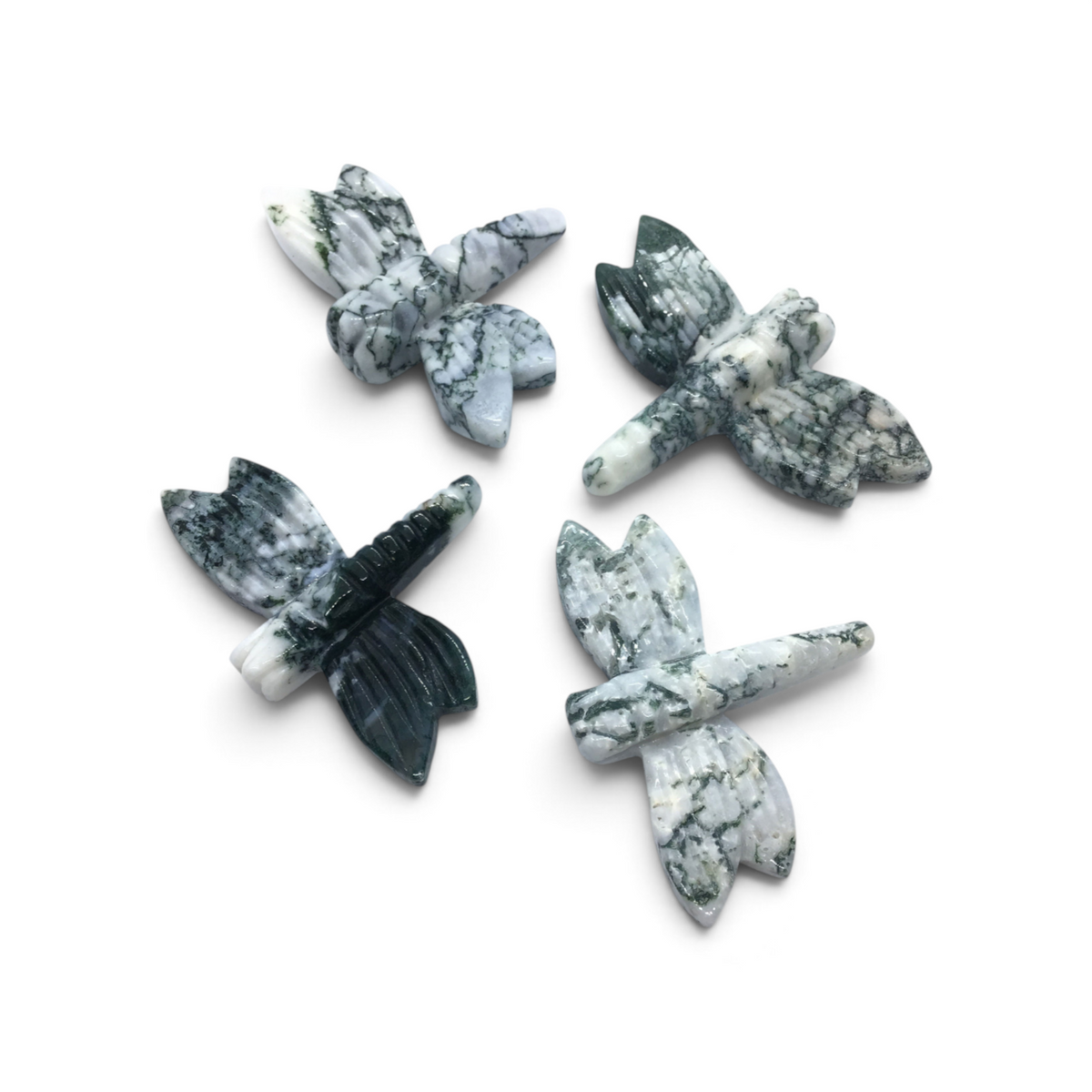 Four moss agate dragonfly carvings, white chalcedony veined with green moss dendrites
