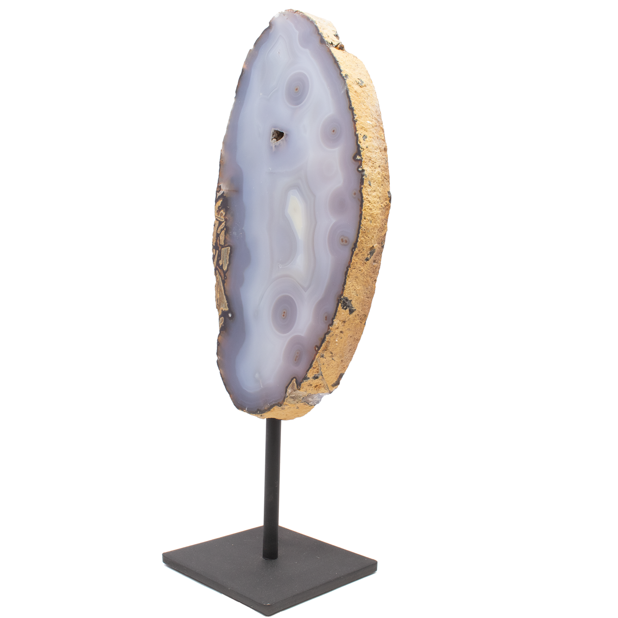 View of Agate Slice on Post Stand - Elongated with Multiple Eyes & Dissolved Pocket in Center