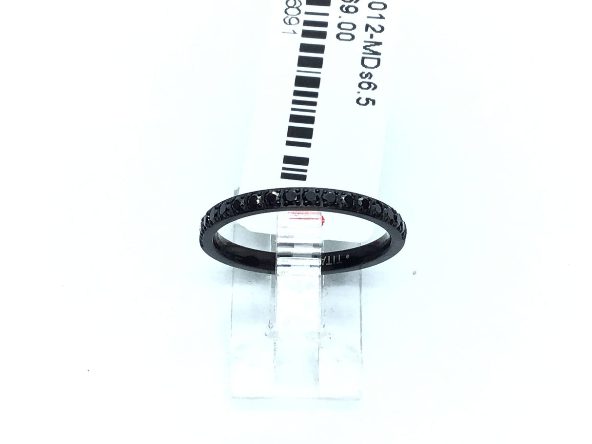 Thin black titanium band set with a row of black cubic zirconia halfway around