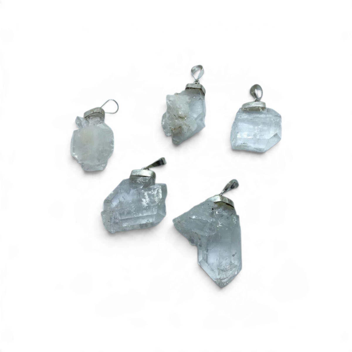 Rare Earth Gallery Faden Quartz medium cluster pendants with silver bails on a white background