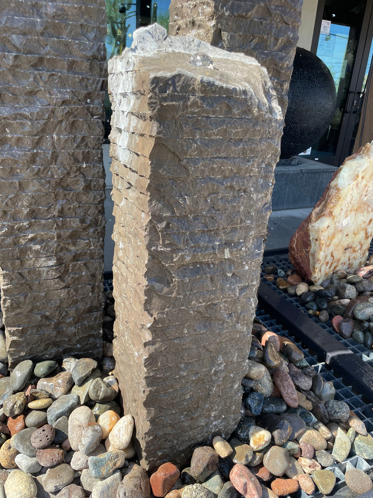 View of Black Travertine Fountain Chiseled Column - Small