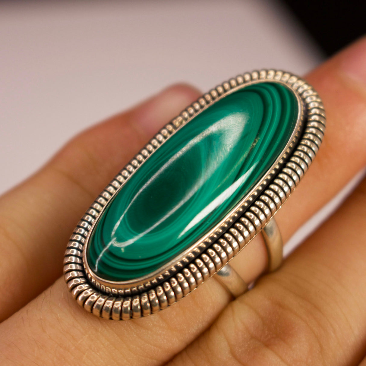 View of Malachite Ring - Elongated Oval Cabochon With 925 Sterling Silver Rope Bezel Edge On Double Band Sz6