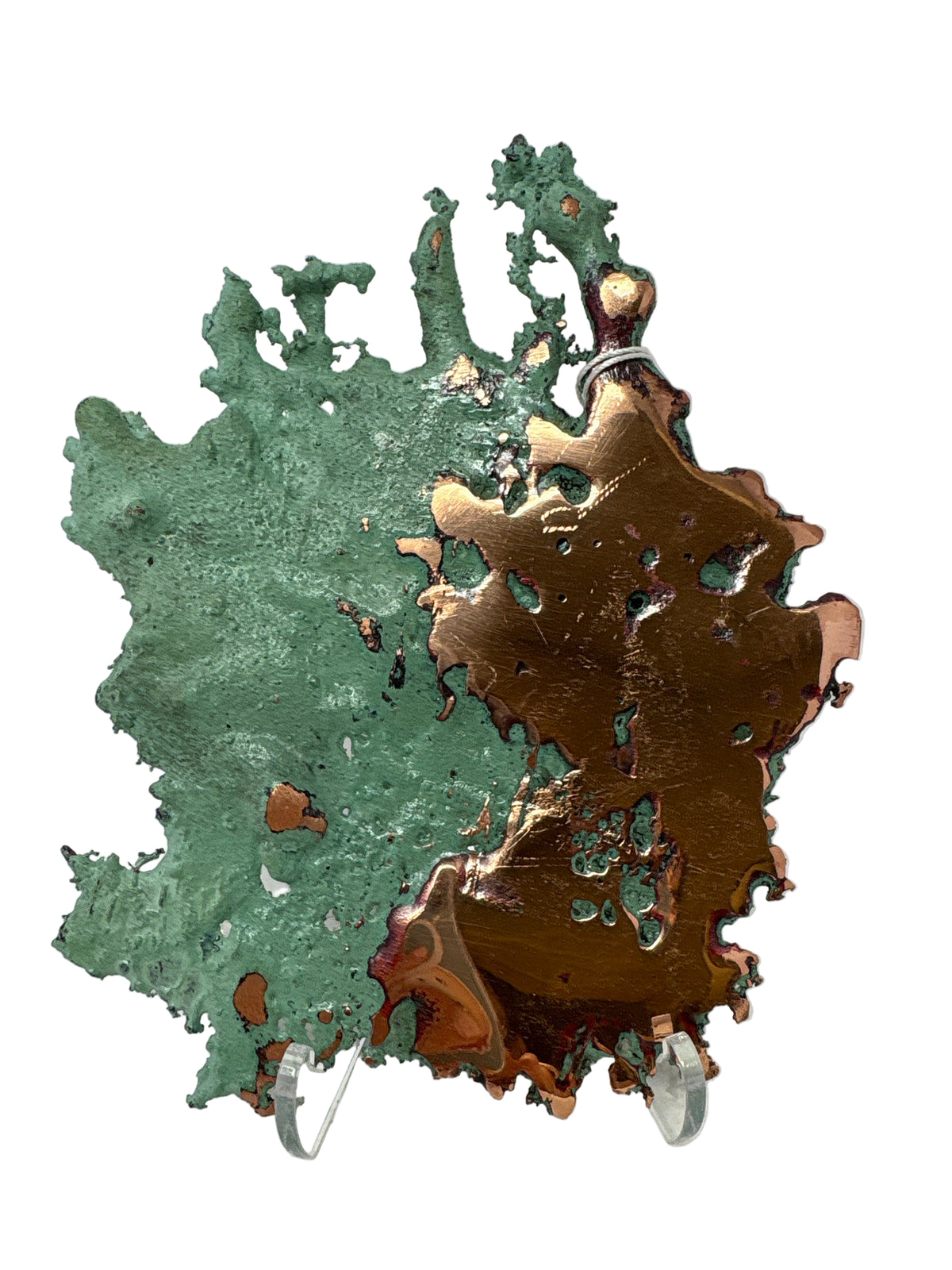 Michigan splash copper split between a green patina left side and polished copper right side