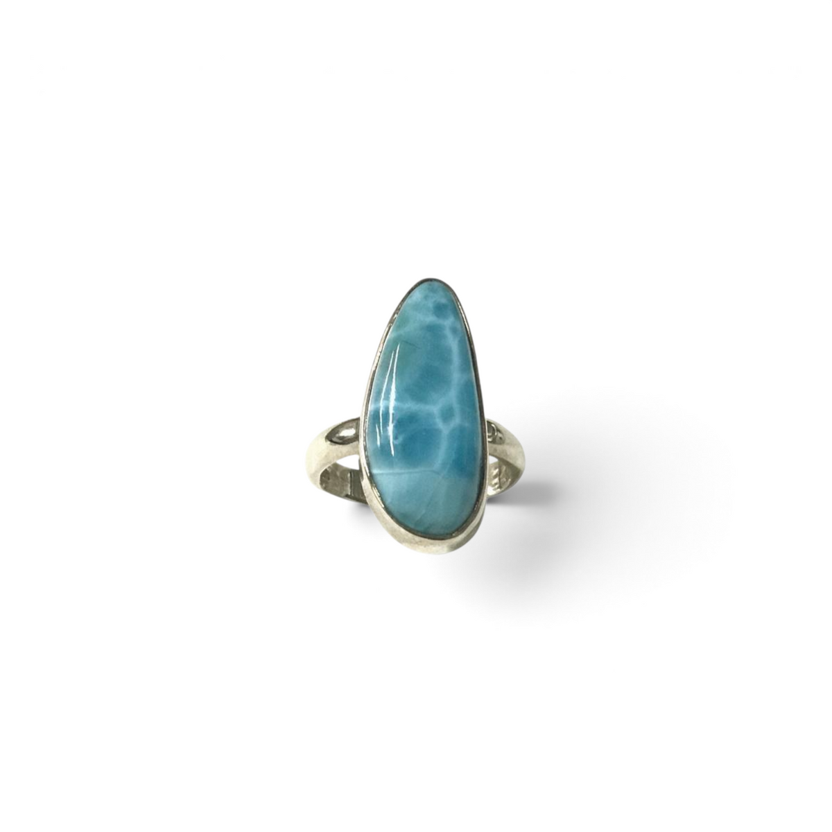 Rare Earth Gallery size 8 ring featuring an elongated freeform blue Larimar cabochon set in a simple silver band
