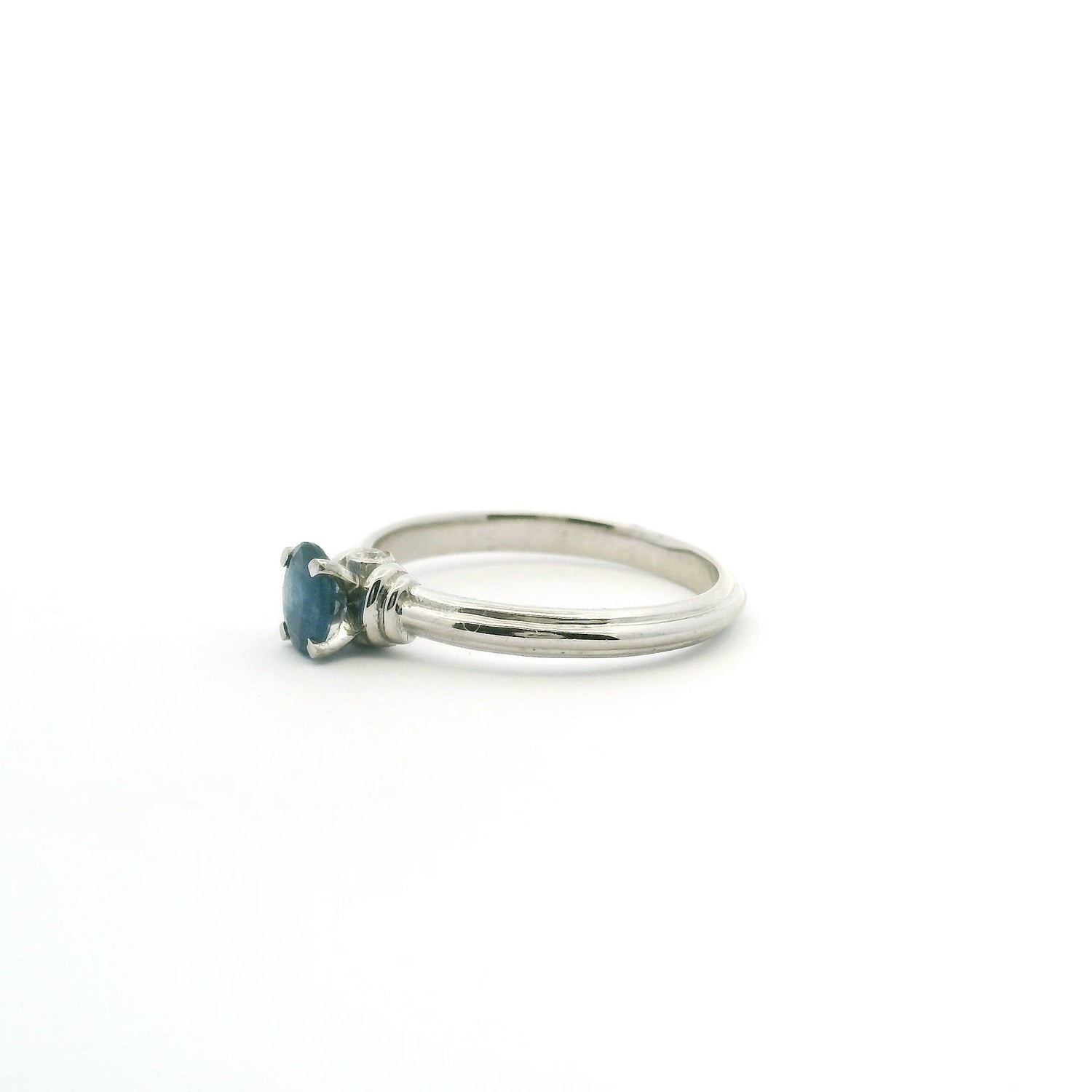 Faceted Blue Sapphire Ring - Oval Prong Set on 925 Sterling Silver Bezel Set with 2 White CZ Crystals on Tapered Band sz6