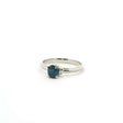 View of Faceted Blue Sapphire Ring - Oval Prong Set on 925 Sterling Silver Bezel Set with 2 White CZ Crystals on Tapered Band sz6