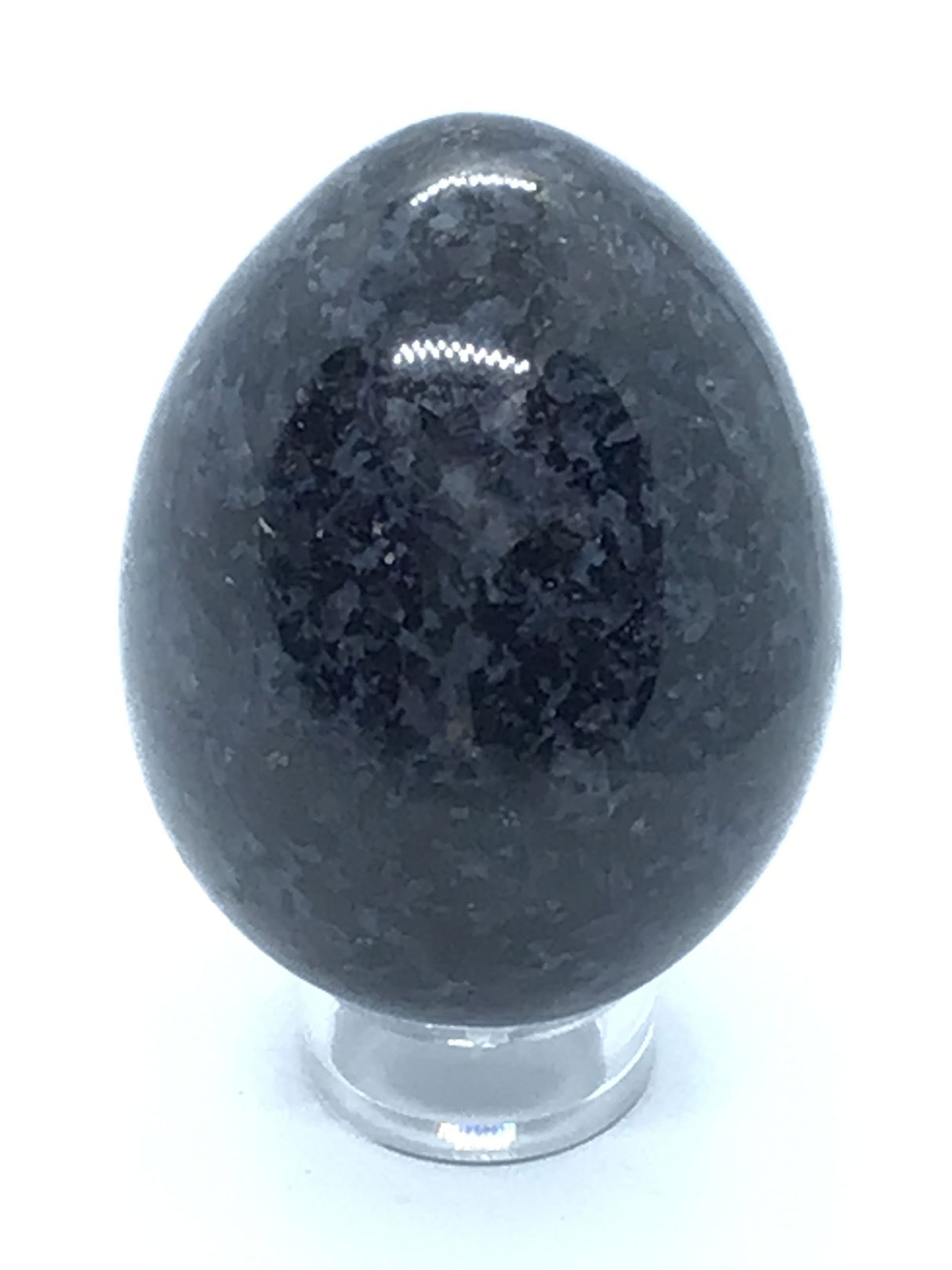 View of Indigo Gabbro Egg aka Merlinite on Lucite Stand
