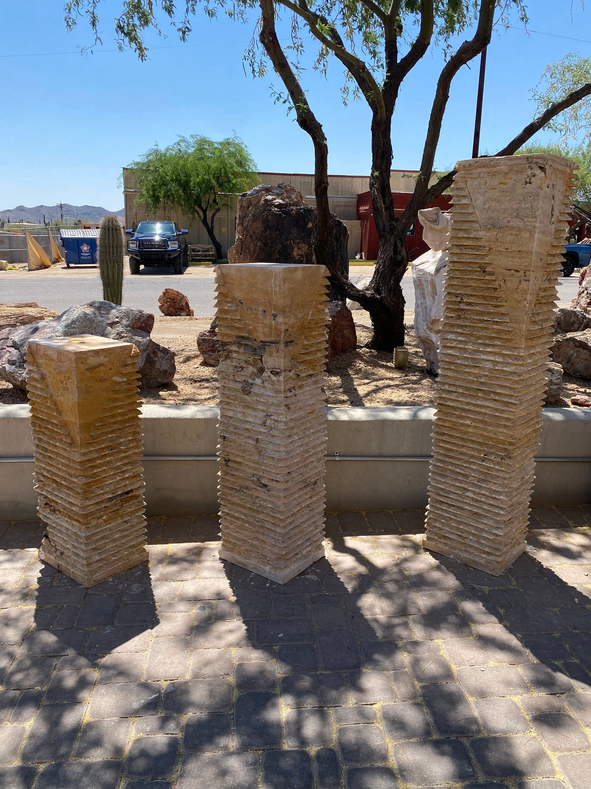 View of Red Travertine Fountain Set Of 3 - Trio Of Chiseled Pillars