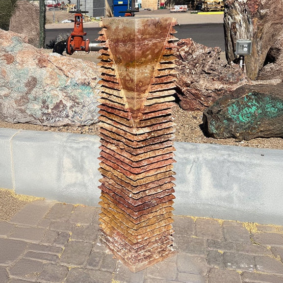 View of Red Travertine Fountain - Chiseled Pillar