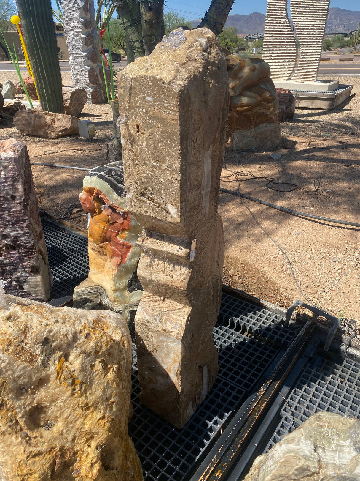 View of Travertine & Onyx Angle Cut Column Fountain