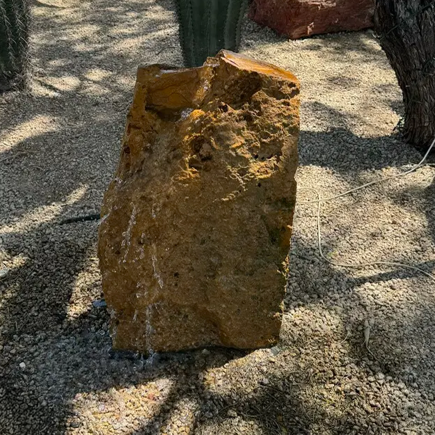 View of Travertine Boulder Fountain With Cut Side