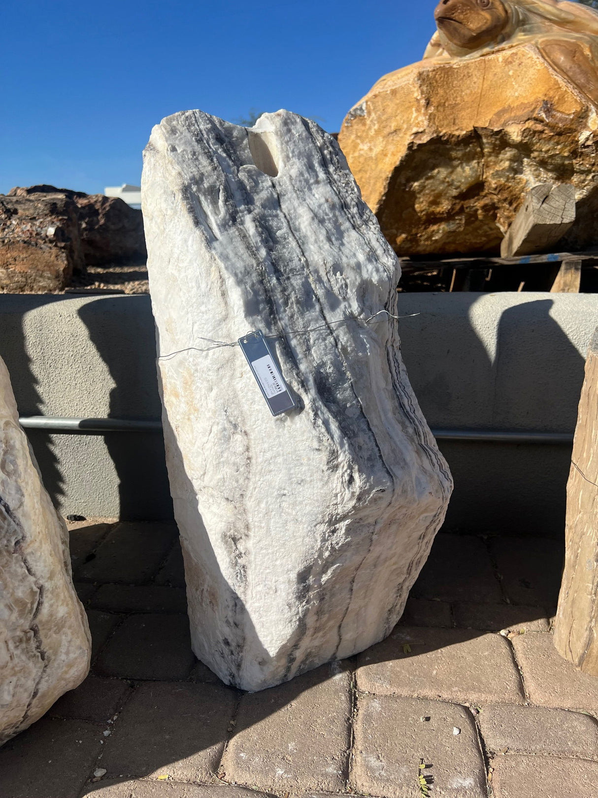 View of Zebra Onyx Boulder Fountain With Cut Face