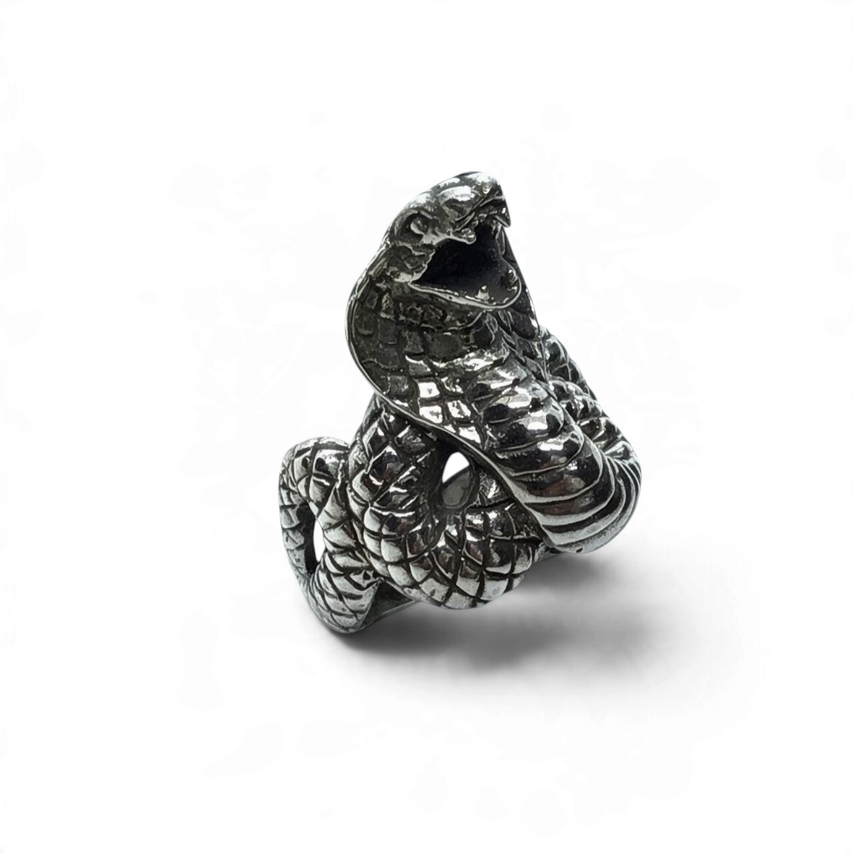 Rare Earth Gallery sterling silver ring featuring a detailed raised cobra snake design with a wavy band