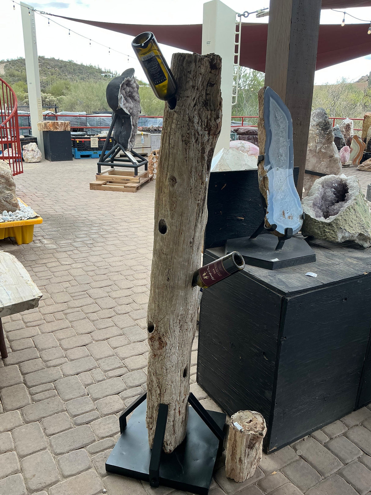 View of Madagascar Petrified Wood Log Wine Holder with 9 Holes