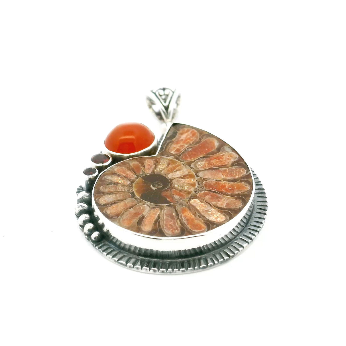 View of Ammonite Fossil Pendant - Open Ammonite Cross-section Inlaid with Sunstone with Carnelian Cabochon & 2 Dainty Faceted Garnets Bezel Set in 925 Sterling Silver with Bead and Line Accents