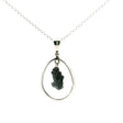 View of Campo De Cielo Meteorite Pendant - Rough J-Shaped Speciman Hanging in Open Oval with 925 Sterling Silver with Chain