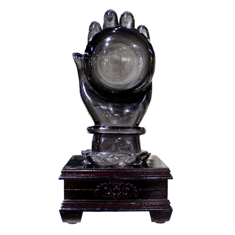 View of Silver Sheen Obsidian Huge Ball in Buddha's Hand with Wooden Stand