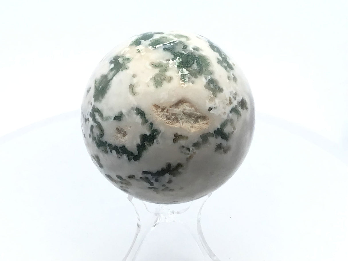 View of Moss Agate Sphere with Lucite Stand