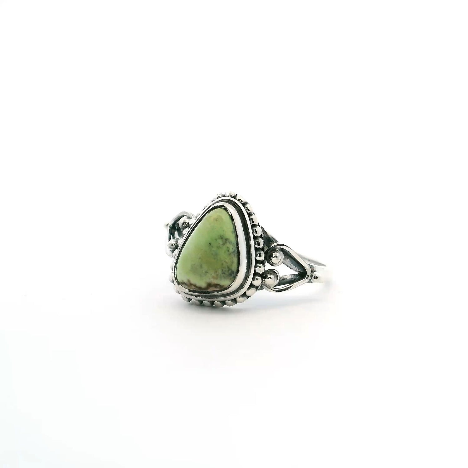 View of Lemon Chrysoprase Ring - Triangular Freeform Cabochon with Dark Brown Inclusion Along Bottom Edge Bezel Set with Beaded Detail in 925 Sterling Silver sz8
