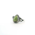 View of Lemon Chrysoprase Ring - Triangular Freeform Cabochon with Dark Brown Inclusion Along Bottom Edge Bezel Set with Beaded Detail in 925 Sterling Silver sz8