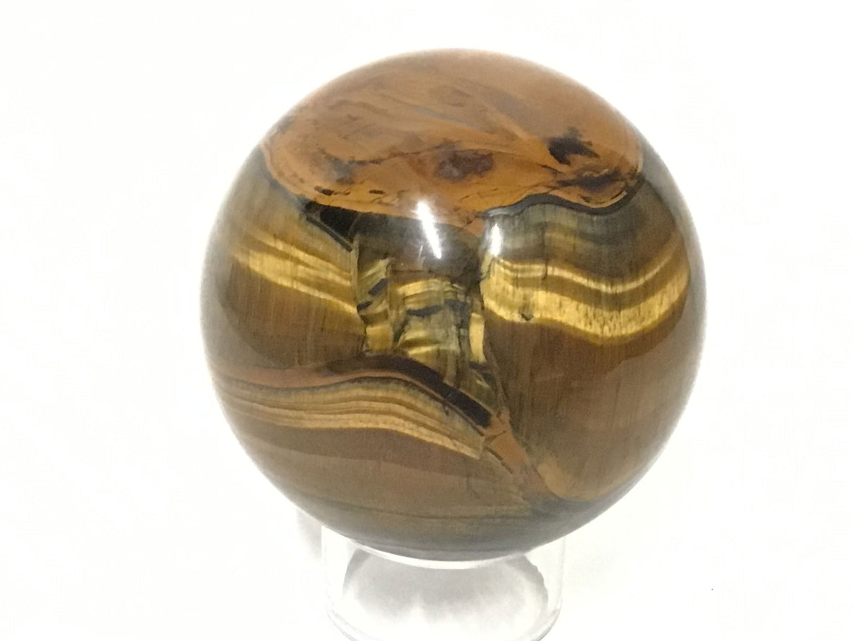 View of Yellow Tigers Eye Sphere with Lucite Ring Stand
