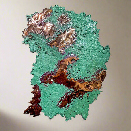 Copper splash with green and brown textures on a white background