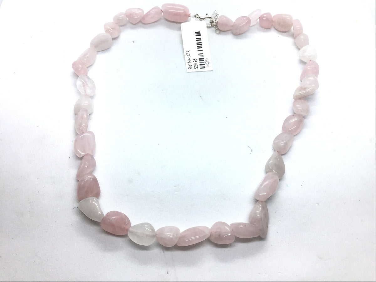 Rose quartz tumbled necklace of glossy pink and white nugget beads with silver clasp