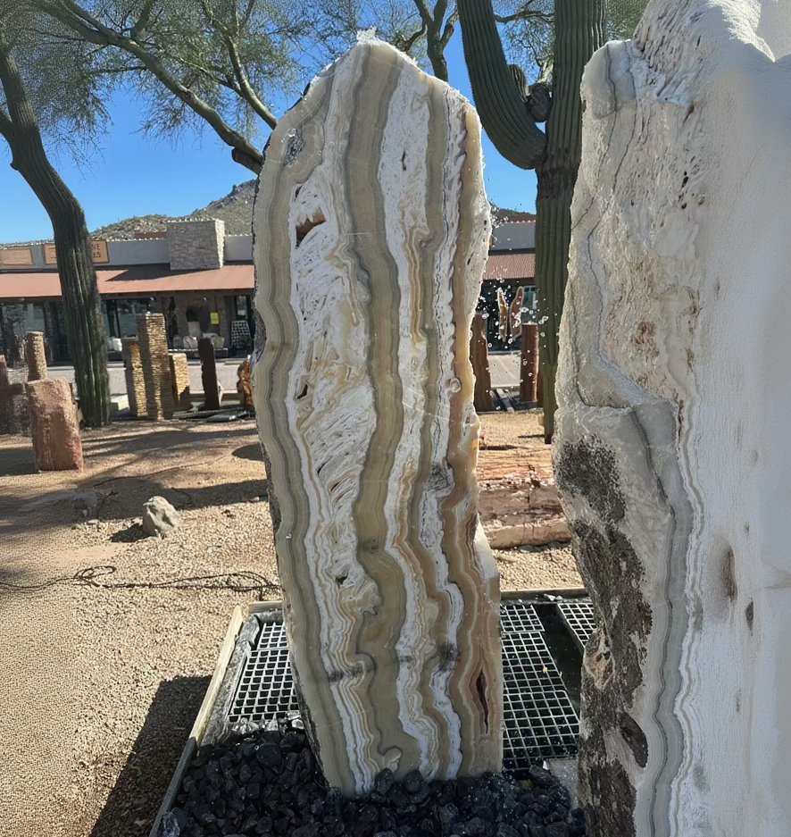 Fontaines colonnes en onyx fossilisé Zèbre