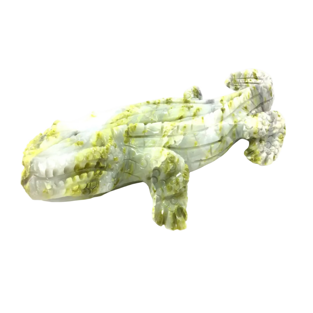Decorative alligator figurine on a white background