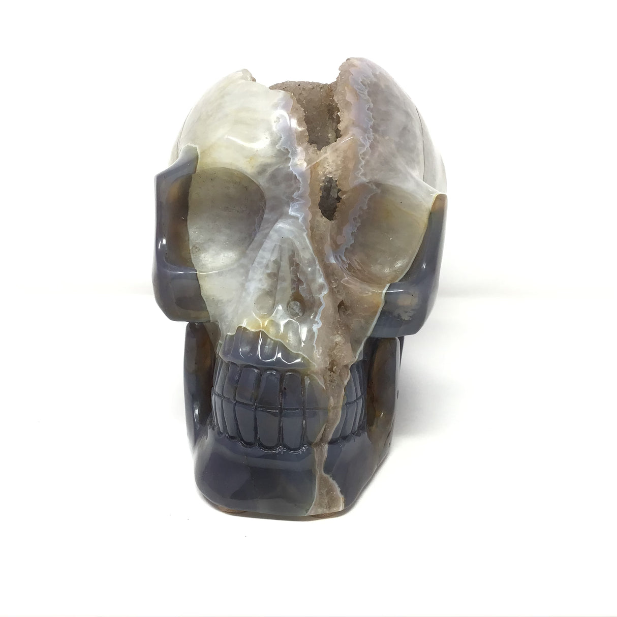 Peach Fuzz Cavern Druze Agate Geode Skull Carving