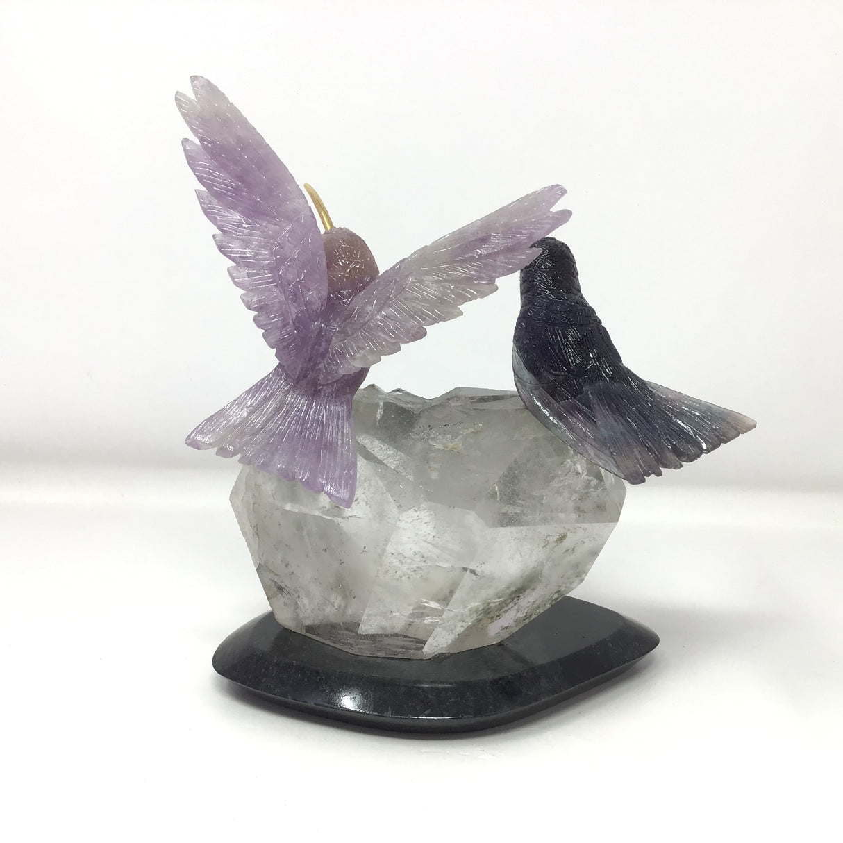 Hand-Carved Purple Fluorite & Amethyst Hummingbird Duo Perched on Faceted Quartz & Lodolite Phantom Crystal with Black Marble Base