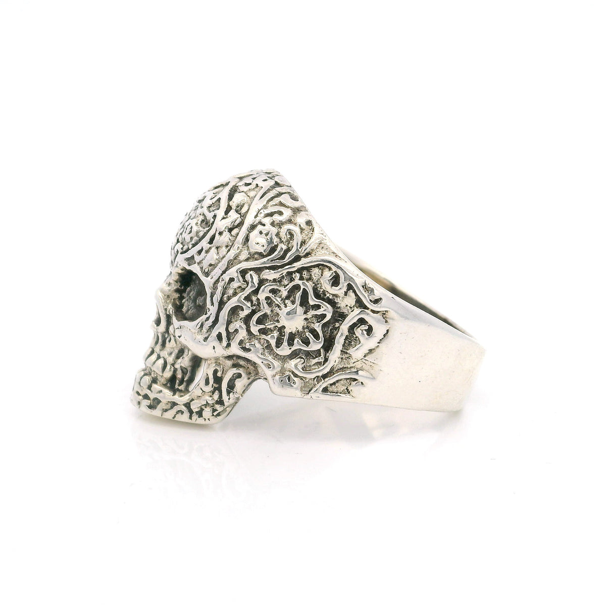 Sterling silver sugar skull ring, side profile with floral scroll detail