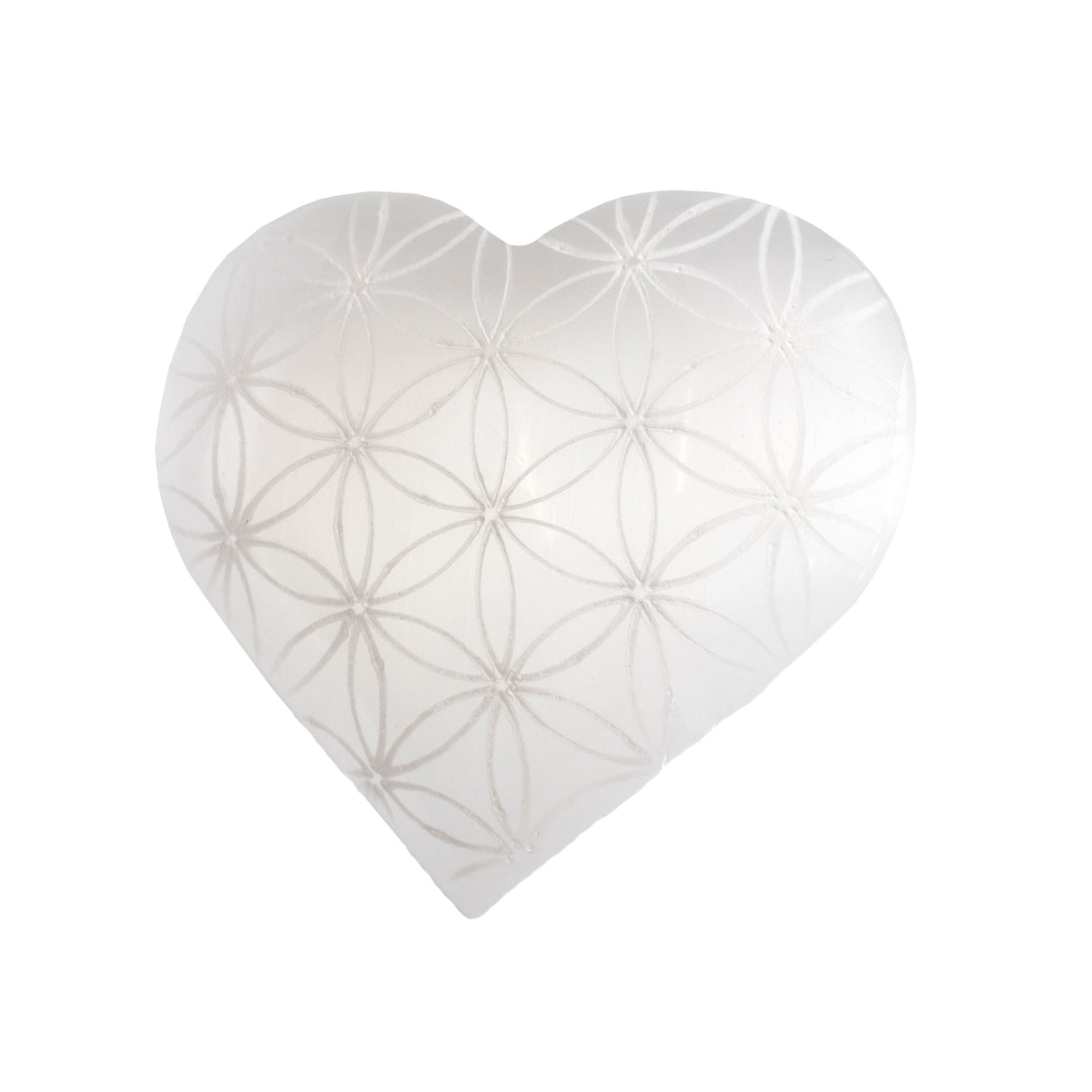 Heart-shaped selenite with sacred geometry pattern on a white background