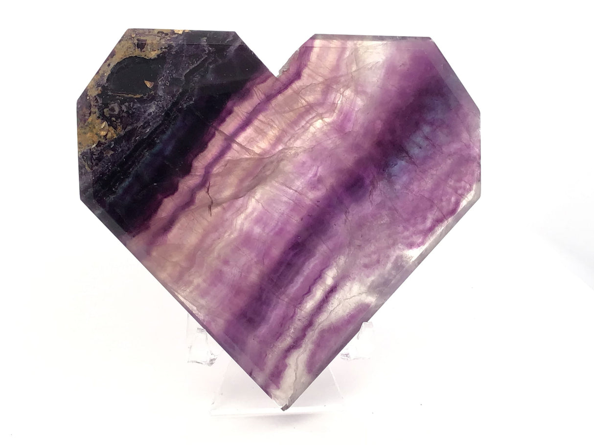Rainbow Fluorite Heart - Flat with Faceted Faces on Lucite Stand (Diagonal Purple Banding & Tan Included Matrix on Curved Edge)