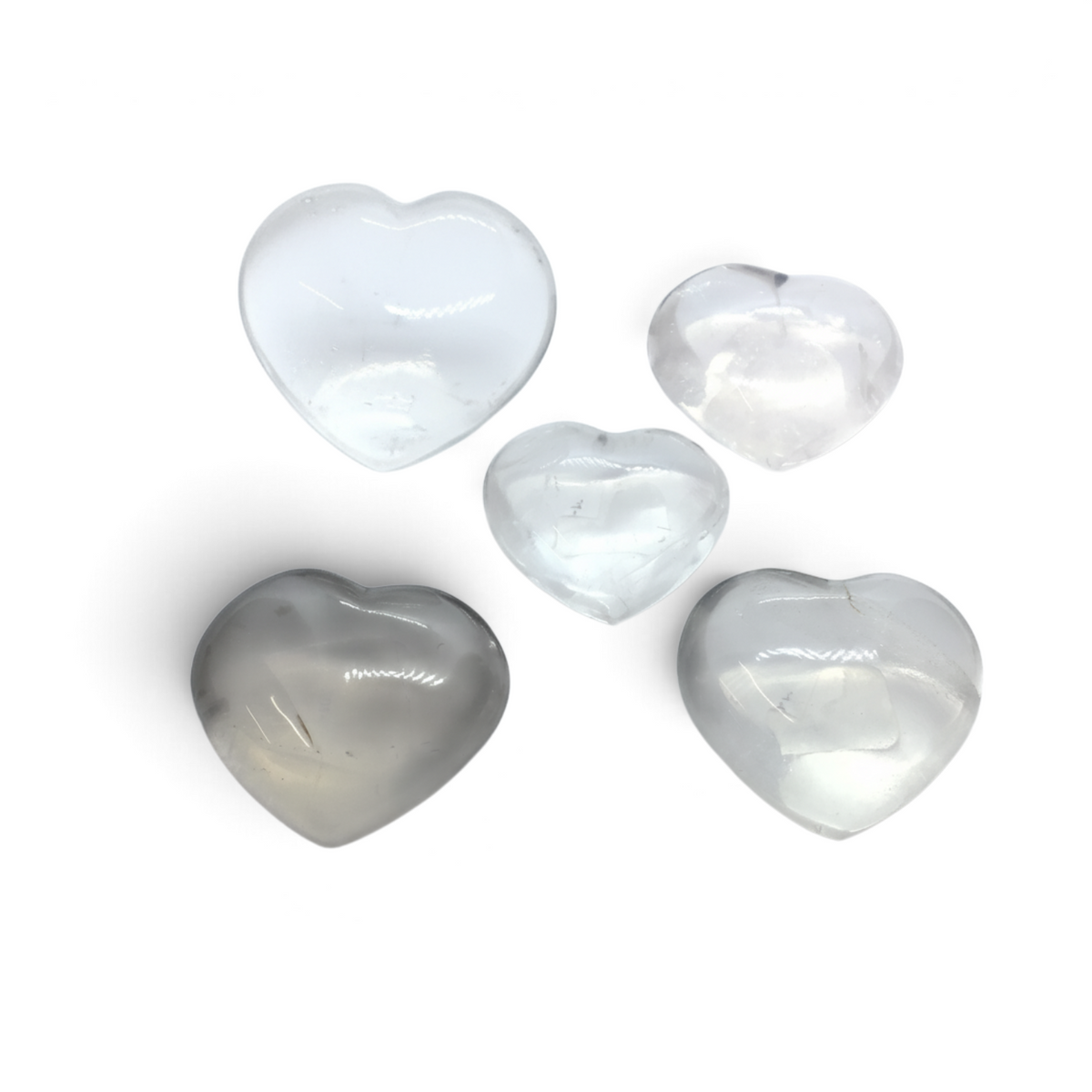 Five polished Girasol Quartz heart-shaped crystals from Rare Earth Gallery, showing translucent milky white tones.
