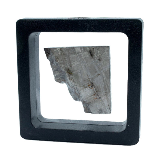 Genuine meteorite specimen in a clear display case with a black border on a white background