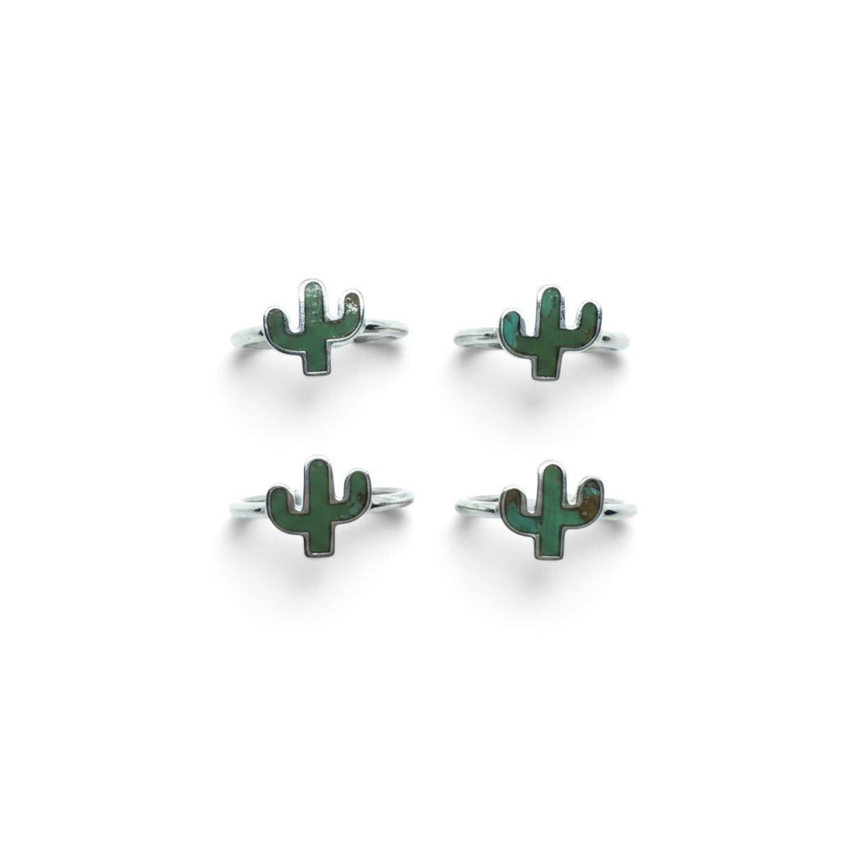 Rare Earth Gallery sterling silver rings featuring green turquoise cactus-shaped bezel settings on a white background