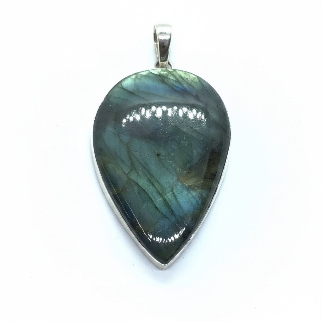 Rare Earth Gallery 2-inch labradorite pendant with reverse pear cabochon, green shift, and electric blue flashes.
