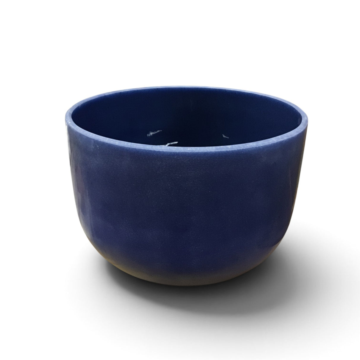 Rare Earth Gallery 10-inch lapis lazuli gem infused quartz singing bowl in deep blue, tuned to note A at 440 Hertz.
