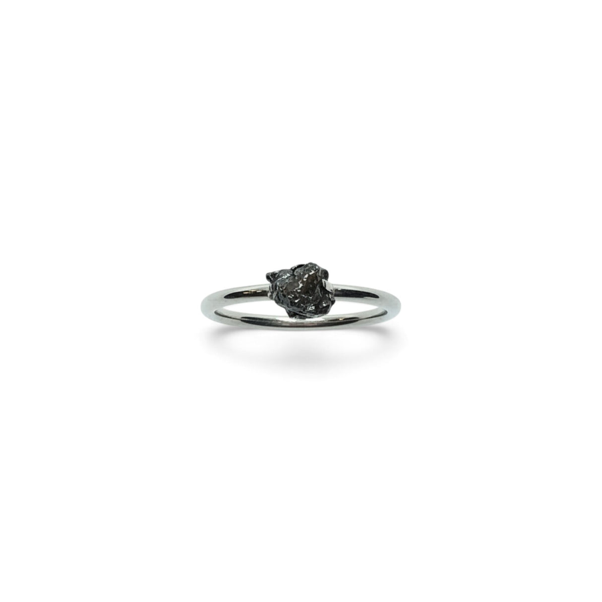 Rare Earth Gallery Campo De Cielo meteorite nugget ring prong-set on a simple polished silver band
