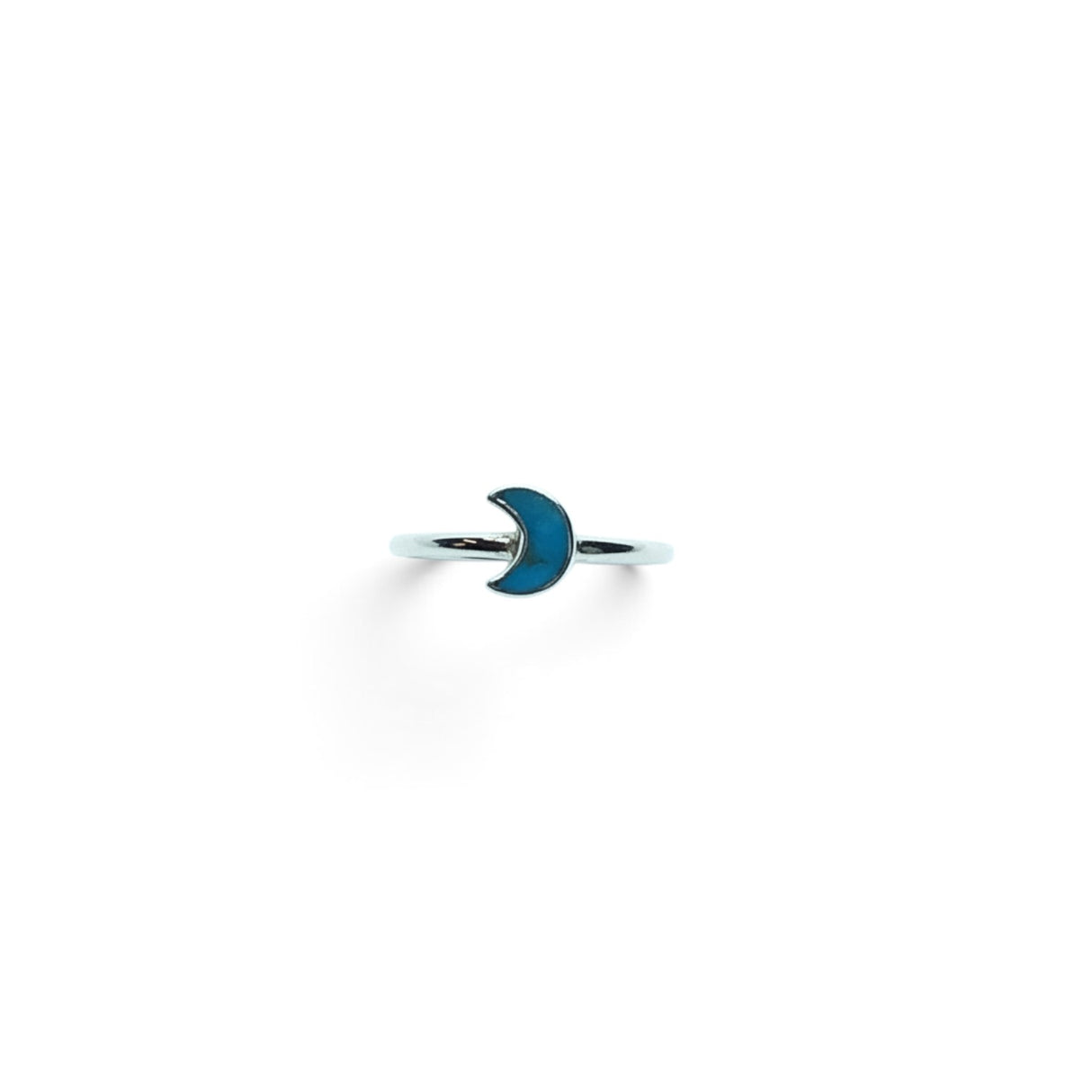 Rare Earth Gallery turquoise half moon ring with a simple silver bezel setting on a white background