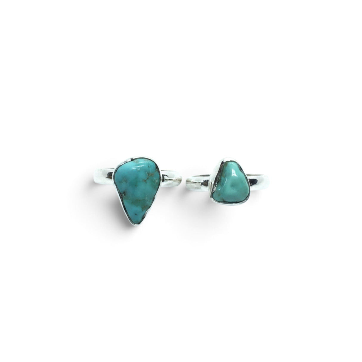 Rare Earth Gallery turquoise nugget rings in polished freeform bezel settings on 925 sterling silver bands.